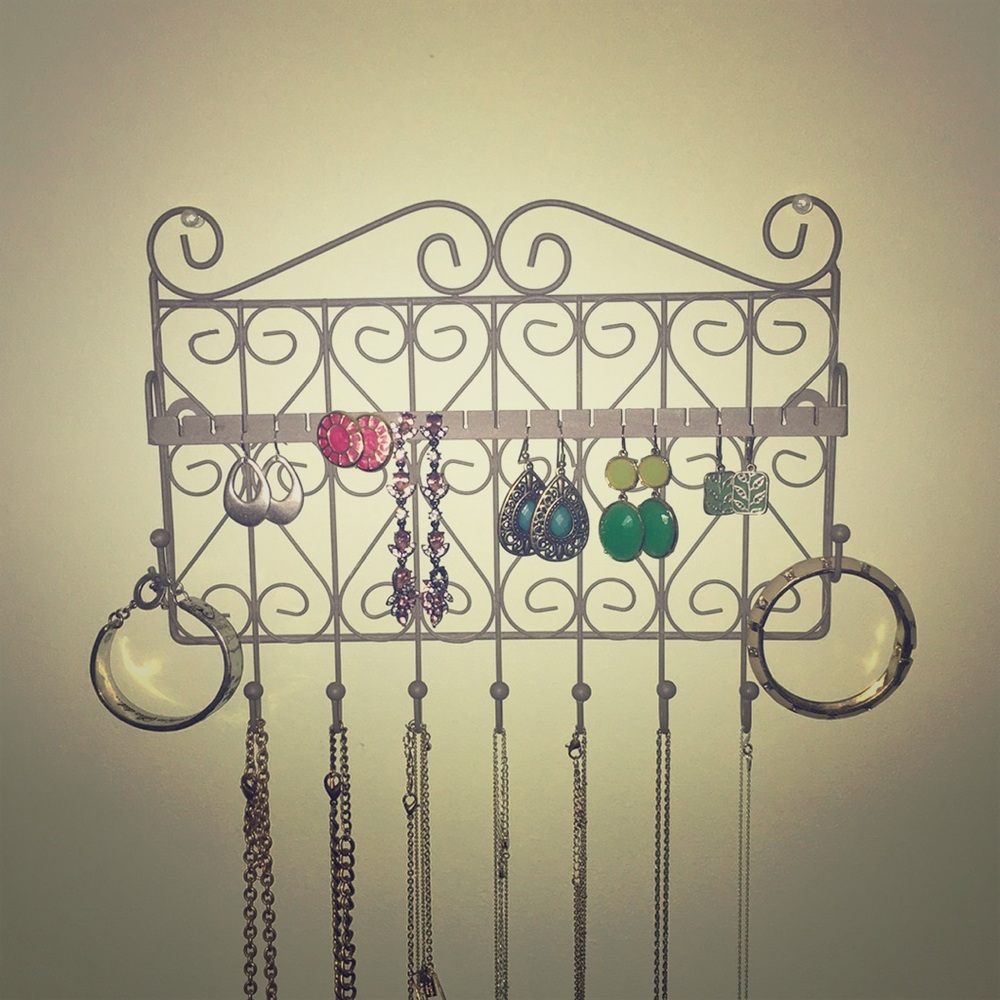 Gray metal wall jewelry holder